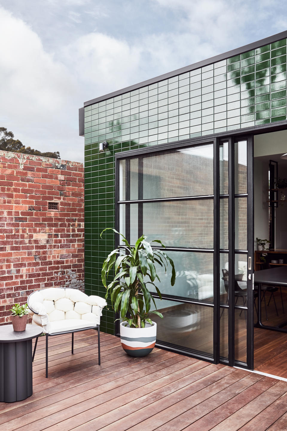 An outdoor space accessorized with pots