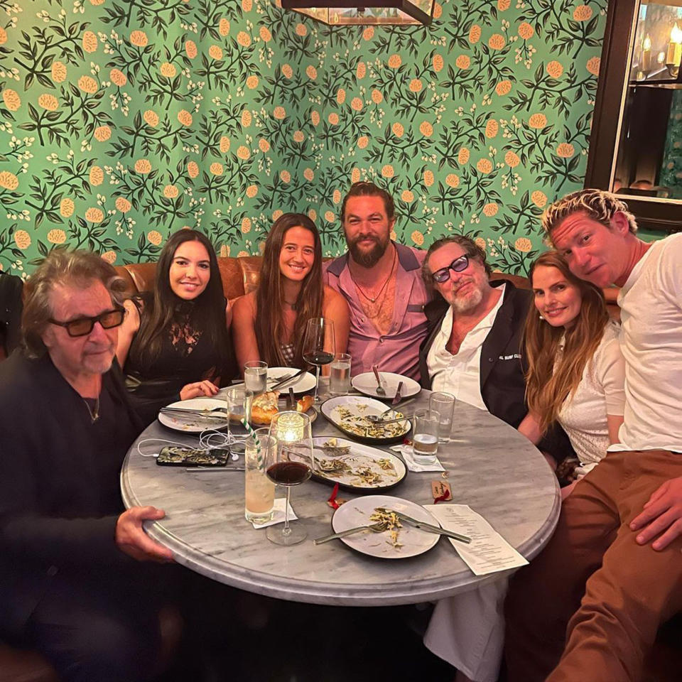 Pacino's case, placed on the table in front of him, left, was first spotted in this photo. (prideofgypsies / Instagram)