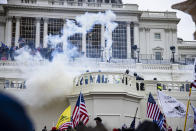 Pro-Trump supporters storm the U.S. Capitol following a rally with President Donald Trump on January 6, 2021 in Washington, DC. (Photo by Samuel Corum/Getty Images)