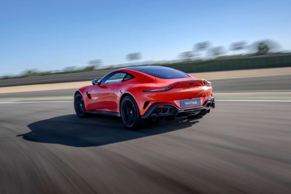 a red sports car on a road