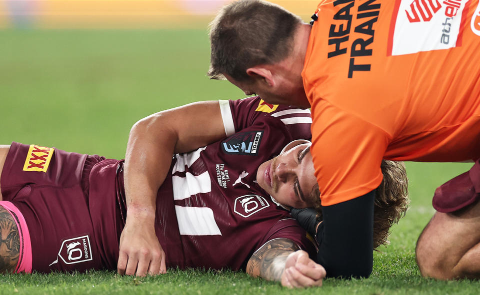 Reece Walsh, pictured here after Joseph Suaalii's illegal hit in State of Origin 1.