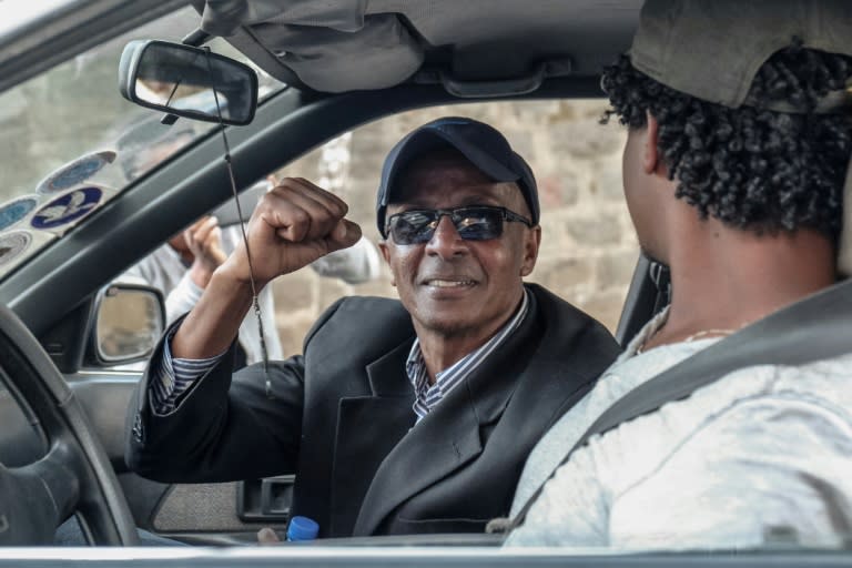 Journalist Eskinder Nega, who was given an 18-year prison sentence in 2012 on accusations of links to a banned group, gestures after being released from prison