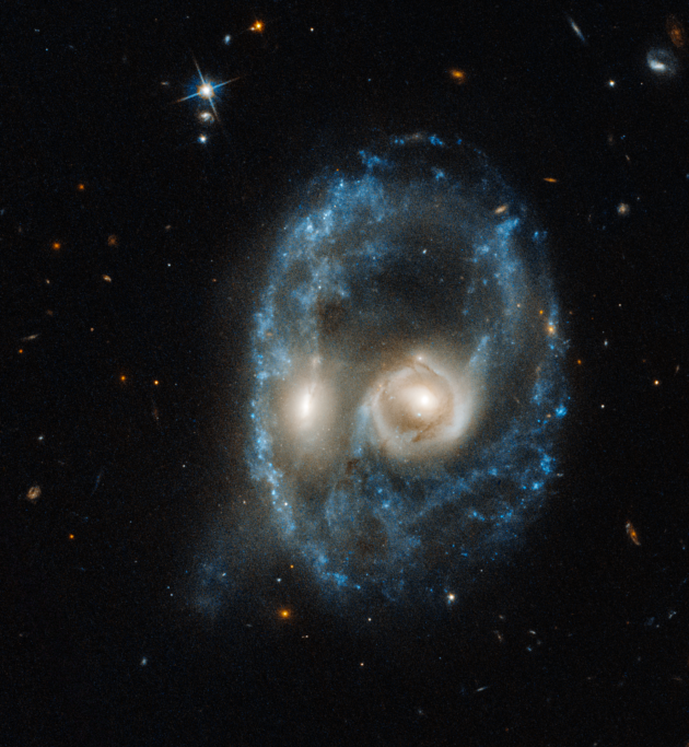 This Hubble image of the merged galaxy known as AM 2026-424 was taken on June 19 in visible light by the Advanced Camera for Surveys. The system resides 704 million light-years from Earth. (NASA / ESA / UW / Dalcanton, Williams and Durbin)