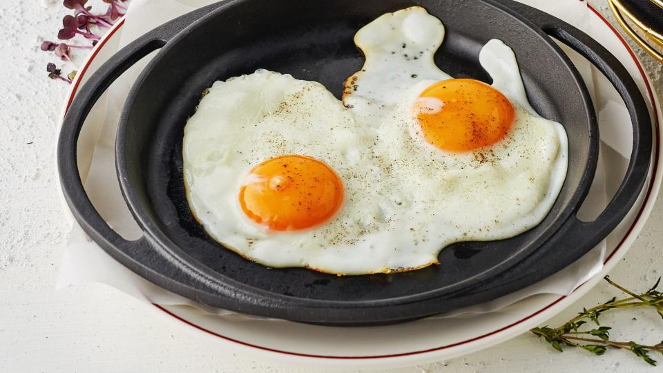 Fried eggs in pan