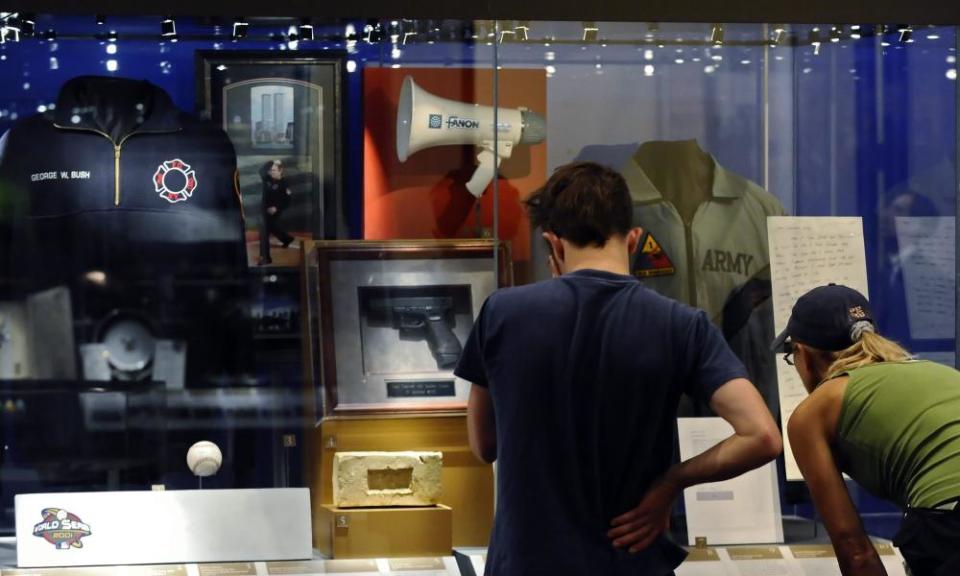 President George W. Bush Presidential Center Exibit.epa02414224 Annie Staffaroni (R) from Dallas and her nephew Beau Deurwaarder (L) from Australia look at items at Southern Methodist University’s Meadows Museum that is hosting The George W. Bush Presidential Center’s Special Exhibit in Dallas, Texas USA, 26 October 2010. Southern Methodist University is the future site of the George W. Bush Presidential Library. EPA/LARRY W. SMITH