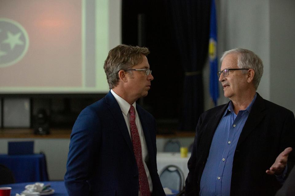 Maury County Mayor Andy Ogles speaks with Dr. Stephen Porter during a joint meeting held by the Columbia Kiwanis Club and the Columbia Rotary Club inside the Memorial Building in Columbia, Tenn., on Friday, Aug. 27, 2021.