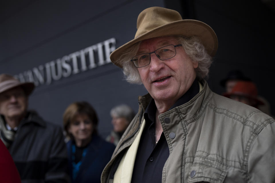 Jos van Wijk, chairman of the Cooperative Last Will, leaves the court in The Hague, Netherlands, Monday, Oct. 10, 2022, where campaigners calling for the decriminalization of assisted suicide in the Netherlands took the Dutch state to court, arguing its ban breaches human rights norms. The case at The Hague District Court was brought by Cooperative Last Will, which has long urged a change of the law to allow people to help relatives end their lives. (AP Photo/Peter Dejong)