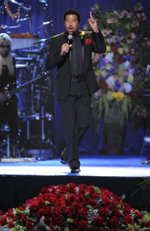 Lionel Richie performs during the Michael Jackson public memorial service held at Staples Center in Los Angeles on July 7, 2009. Together, Richie and Jackson wrote the song "We Are the World," a song dozens of popular musicians recorded for charity January 28, 1985. File Photo by Mark J. Terrill/Pool