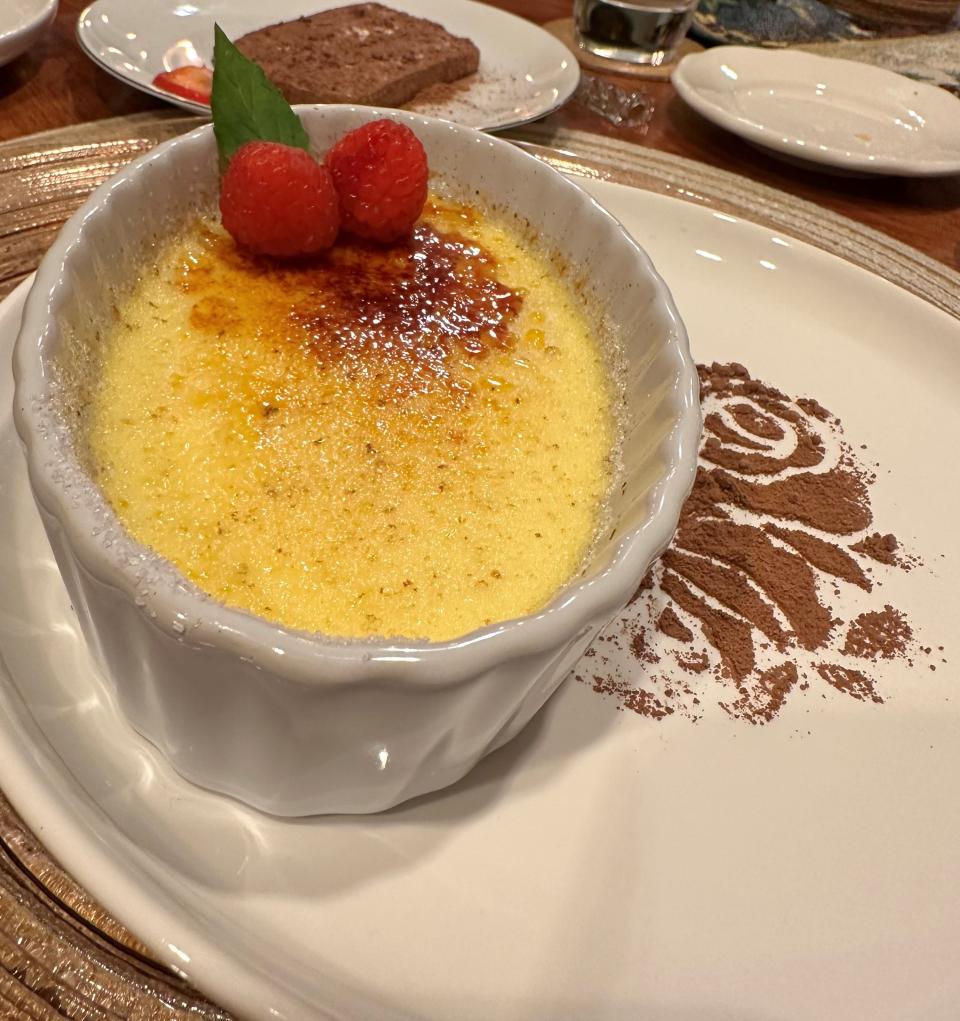 A perfectly baked and crusted creme brulee, alongside a slice of Chef Angela Marie Perkins' decadent chocolate mousse.