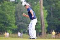 Justin Rose celebrates as he sinks a birdie on the 18th green during the final round of the Zurich Classic at TPC Louisiana. Mandatory Credit: Derick E. Hingle-USA TODAY Sports