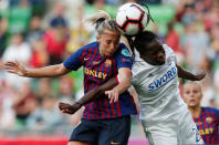 Soccer Football - Women's Champions League Final - Ferencvaros Stadium, Budapest, Hungary - May 18, 2019 Barcelona's Toni Duggan in action with Olympique Lyonnais' Griedge Mbock REUTERS/Bernadett Szabo