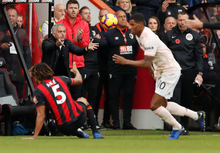 Soccer Football - Premier League - AFC Bournemouth v Manchester United - Vitality Stadium, Bournemouth, Britain - November 3, 2018 Manchester United manager Jose Mourinho catches the ball Action Images via Reuters/John Sibley