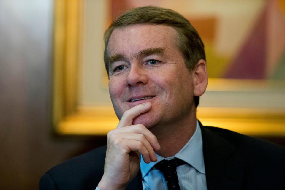 Sen. Michael Bennet, D-Colo., listens during a question and answer session with a small group of journalists at a hotel, as he visits Mexico City in 2017. Bennet jumped into the packed Democratic presidential primary on Thursday, announcing a 2020 campaign that had been stalled while he was treated for prostate cancer.