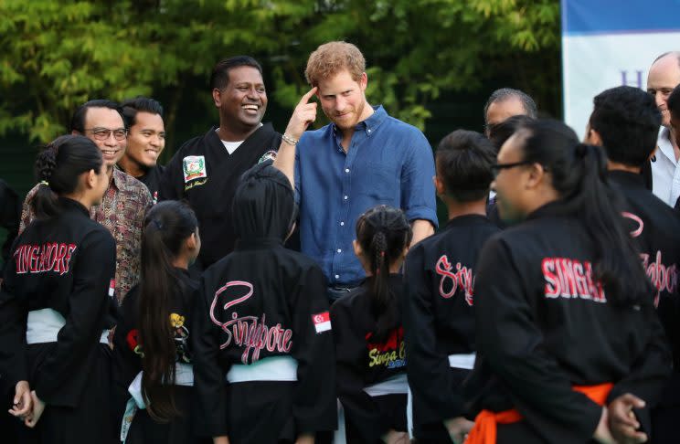 SINGAPORE - JUNE 04: Prince Harry watches a martial arts demonstration at Jamiyah Singapore on the first day of a two day visit to Singapore on June 4, 2017 in Singapore. (Photo by Chris Jackson/Getty Images)