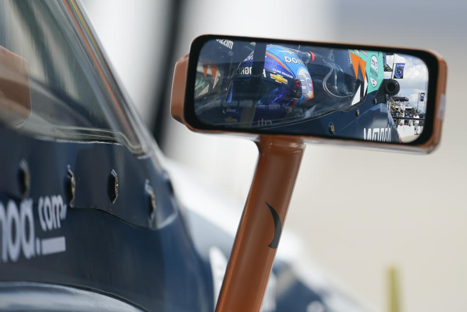 Fernando Alonso, of Spain, sits in his car during a practice session for the Indianapolis 500 auto race at Indianapolis Motor Speedway, Friday, Aug. 14, 2020, in Indianapolis. (AP Photo/Darron Cummings)