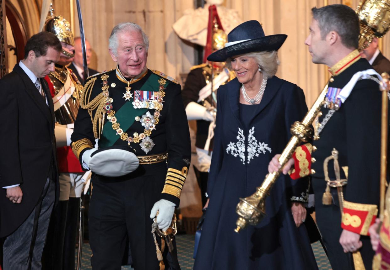 Britain's Prince Carlos, Prince of Wales, son of Isabel II (centre left) and Britain's Camilla, Duchess of Cornwall (centre right) depart through the Sovereign's Entrance after attending the State Opening of Parliament at the Houses of Parliament, in London, on May 10, 2022. - Queen Elizabeth II will miss Tuesday's ceremonial opening of Britain's parliament, as Prime Minister Boris Johnson tries to reinvigorate his faltering government by unveiling its plans for the coming year. (Photo by Chris Jackson / POOL / AFP) (Photo by CHRIS JACKSON/POOL/AFP via Getty Images)