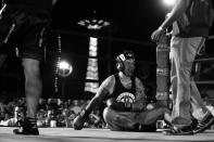 <p>Sgt. John Keigans is knocked to the canvas by opponent Sgt. Billy Polanco during a grudge match at the Brooklyn Smoker in the parking lot of Gargiulo’s Italian restaurant in Coney Island, Brooklyn, on Aug. 24, 2017. (Photo: Gordon Donovan/Yahoo News) </p>