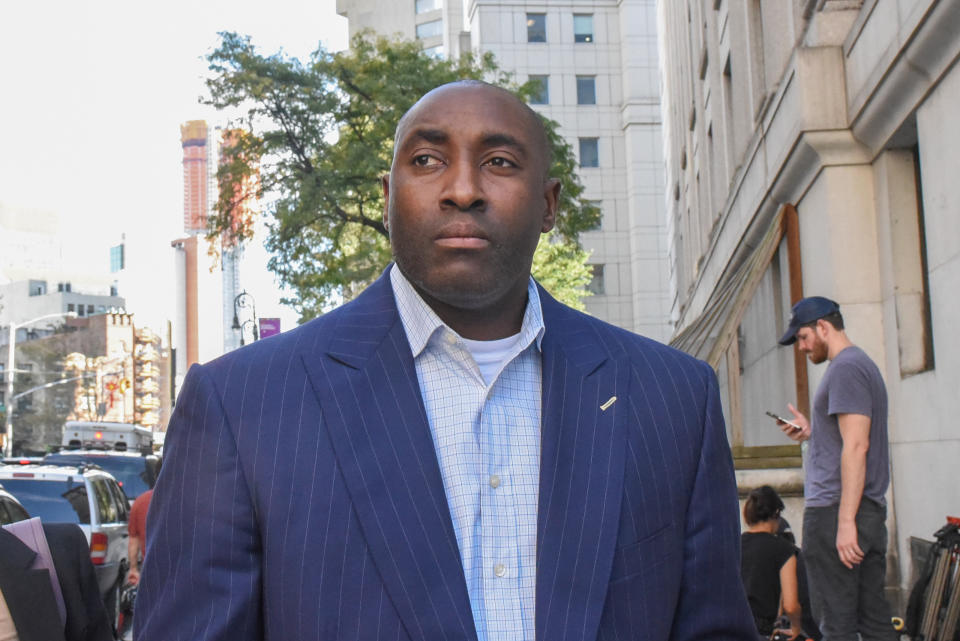 Rashan Michel exits the federal courthouse in Manhattan on Oct. 10 in New York. (Getty)