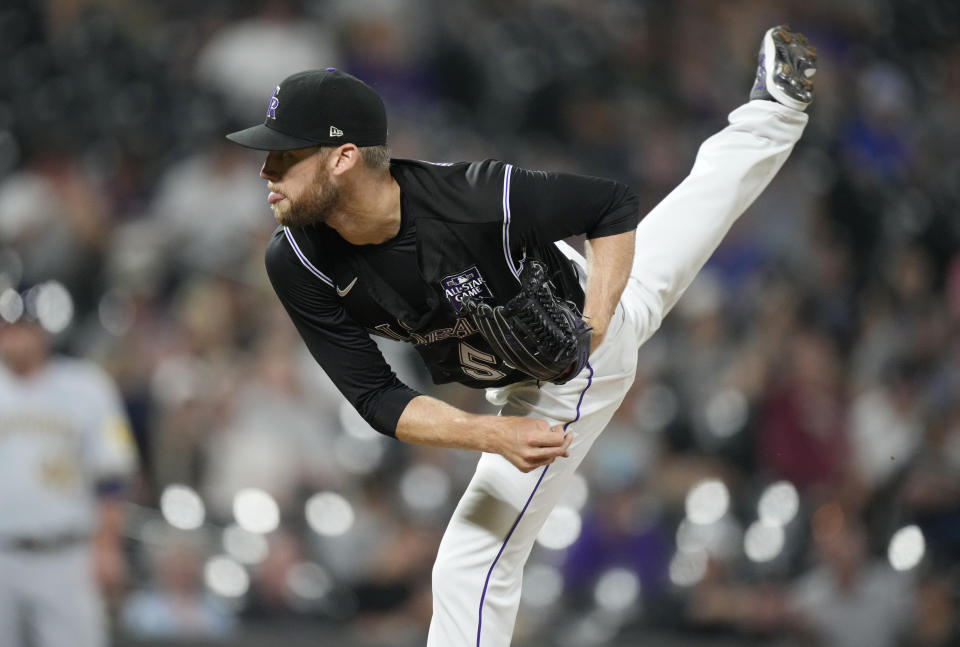Colorado Rockies relief pitcher Daniel Bard works agtainst the Milwaukee Brewers during the ninth inning of a baseball game Thursday, June 17, 2021, in Denver. The Rockies won 7-3. (AP Photo/David Zalubowski)
