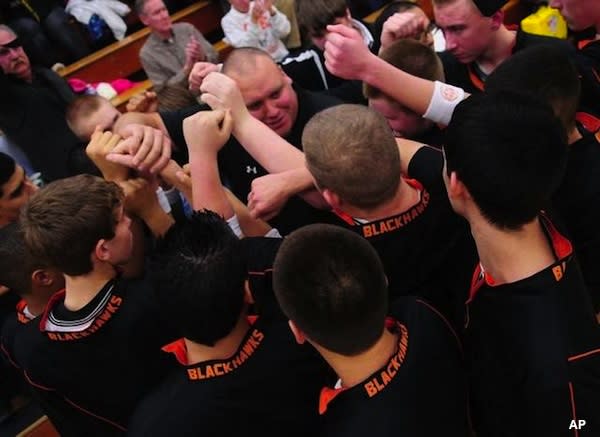 Fennville basketball coach Ryan Klingler after his emotional pregame speech before his team's first game of the 2011-12 season