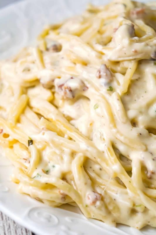 <p>This Is Not Diet Food</p><p>Instant Pot bacon cream cheese spaghetti is an easy pasta recipe made with heavy cream, chive and onion cream cheese, cream of bacon soup, shredded cheese and crumbled bacon.</p><p><strong>Get the recipe: <a href="https://www.thisisnotdietfood.com/instant-pot-bacon-cream-cheese-spaghetti/" rel="nofollow noopener" target="_blank" data-ylk="slk:Instant Pot Bacon Cream Cheese Spaghetti;elm:context_link;itc:0;sec:content-canvas" class="link ">Instant Pot Bacon Cream Cheese Spaghetti</a></strong></p>