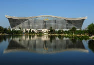 About 400,000 sq m of the building will be devoted to shopping. It will also house offices, conference rooms, a university complex, two commercial centres, hotels, an IMAX cinema, a "Mediterranean village", a pirate ship and skating rink. AFP PHOTO