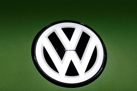 FILE PHOTO: A Volkswagen logo is seen on a new car model at the 89th Geneva International Motor Show in Geneva, Switzerland March 5, 2019. REUTERS/Denis Balibouse