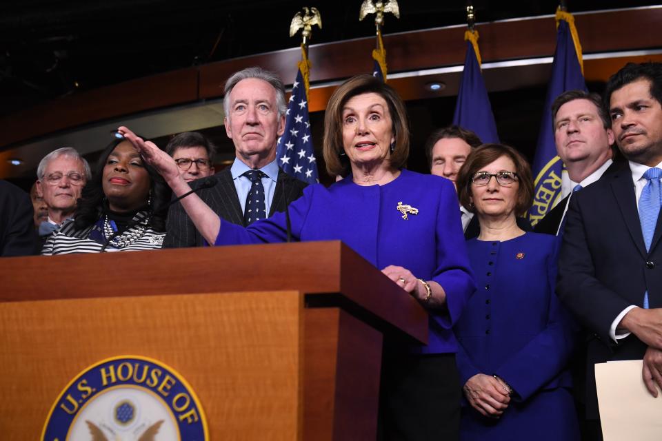 Speaker of the House Nancy Pelosi and House Ways and Means Committee Chairman Richard Neal, Democrat of Massachusetts, speaks about the US - Mexico - Canada Agreement, known as the USMCA, on Capitol Hill in Washington, DC, December 10, 2019. (Photo: Saul Loeb/AFP via Getty Images)