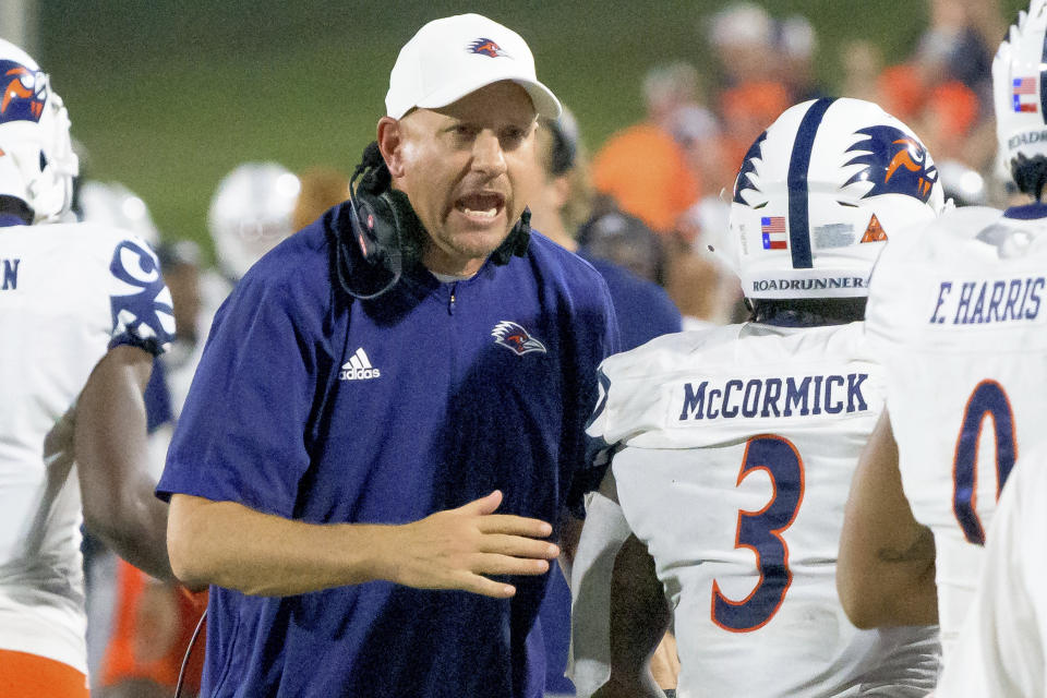 UTSA head coach Jeff Traylor celebrates a touchdown with running back Sincere McCormick (3) in the first half of an NCAA college football game against Louisiana Tech in Ruston, La., Saturday, Oct. 23, 2021. (AP Photo/Matthew Hinton)