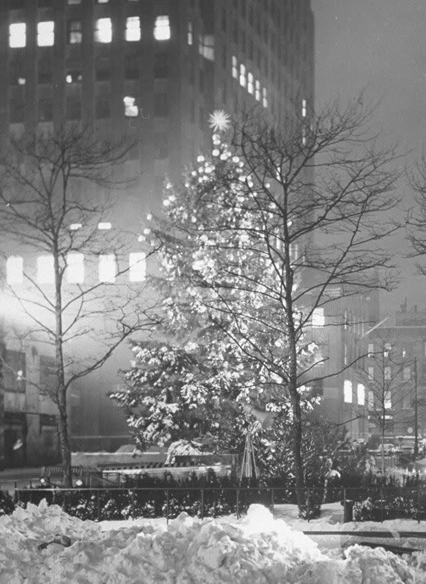 <p>After four years of keeping the trees dark because of black-out regulations during World War II, the tree was glowing once again in 1945. During the "dark years," the center had three trees decorated with painted wooden stars and unlit red, white and blue globes. </p><p><strong>RELATED:</strong> <a href="https://www.goodhousekeeping.com/holidays/christmas-ideas/g2725/christmas-games/" rel="nofollow noopener" target="_blank" data-ylk="slk:27 Christmas Games Your Whole Family Will Love »" class="link ">27 Christmas Games Your Whole Family Will Love »</a></p>