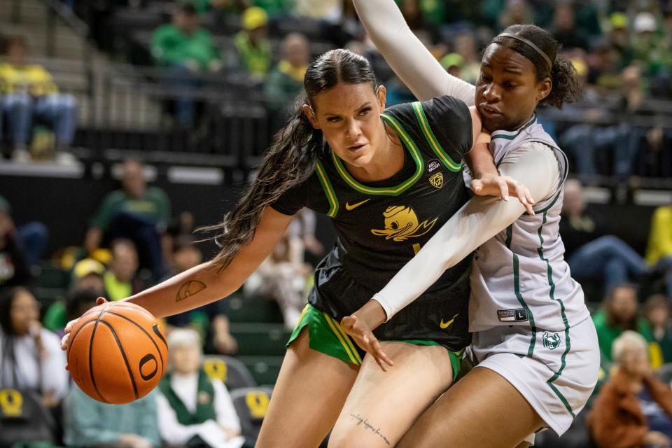 Oregon forward Kennedy Basham drives under the basket as the Oregon Ducks host Portland State Saturday, Dec. 9, 2023, at Matthew Knight Arena in Eugene, Ore.