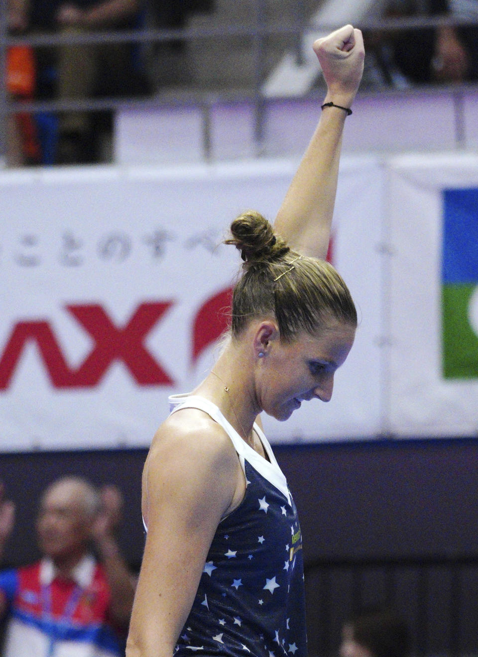 Karolina Pliskova, of Czech Republic celebrates after defeating Naomi Osaka, of Japan during the final match of the Pan Pacific Open women's tennis tournament in Tokyo Sunday, Sept. 23, 2018. (AP Photo/Eugene Hoshiko)