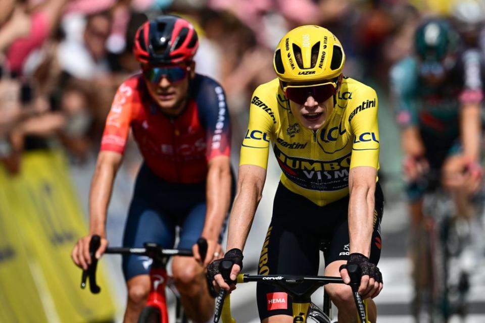 JumboVismas Danish rider Jonas Vingegaard wearing the overall leaders yellow jersey  cycles past the finish line of the 8th stage of the 110th edition of the Tour de France cycling race 201 km between Libourne and Limoges in central western France on July 8 2023 Photo by Marco BERTORELLO  AFP Photo by MARCO BERTORELLOAFP via Getty Images