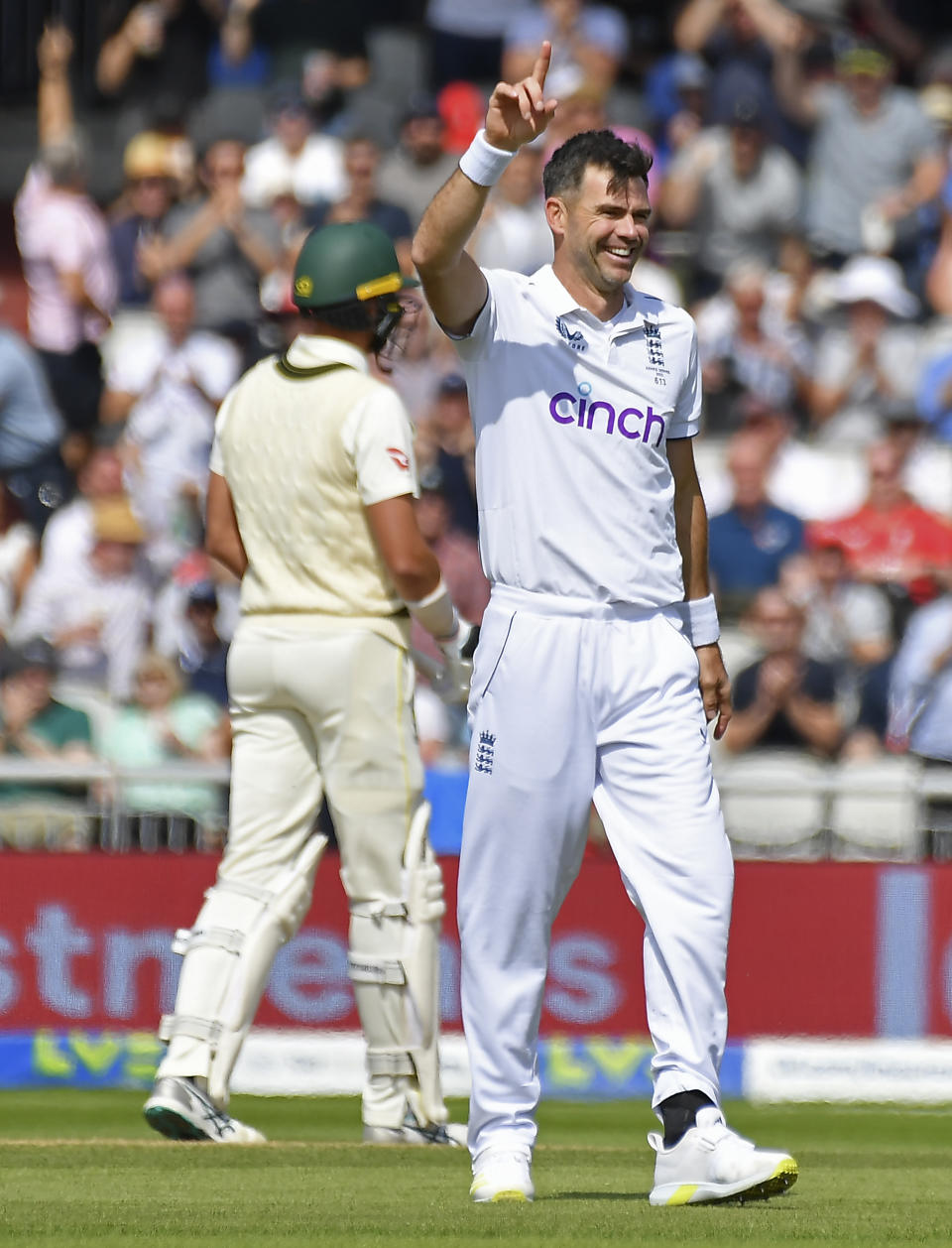 England's James Anderson celebrates the dismissal of Australia's captain Pat Cummins during the second day of the fourth Ashes cricket Test match between England and Australia at Old Trafford in Manchester, England, Thursday, July 20, 2023. (AP Photo/Rui Vieira)