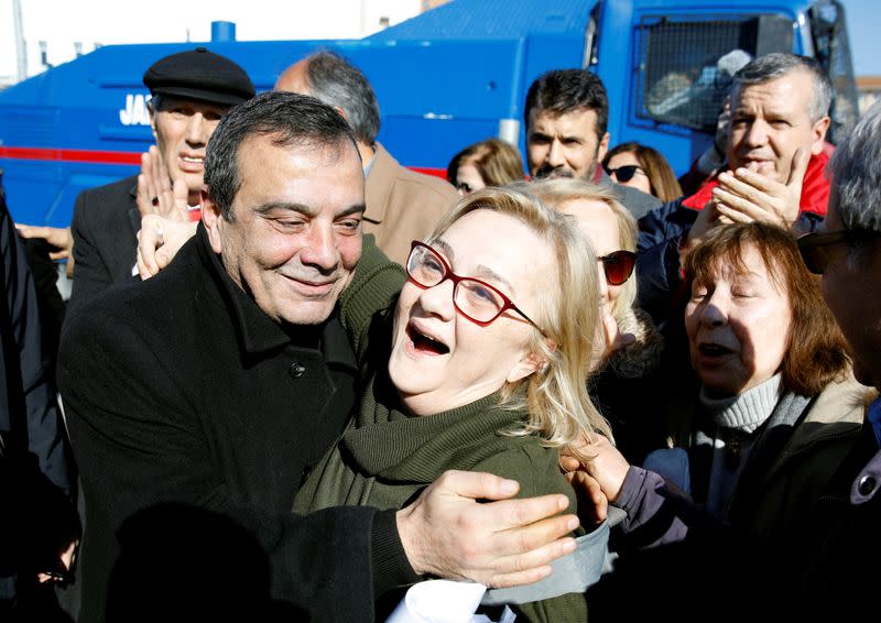 Mucella Yapici reacts after leaving courtroom at Silivri Prison and Courthouse complex in Silivri