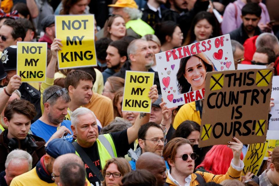 Anti-monarchy protesters gather among well-wishers ahead of the Coronation of King Charles III and Queen Camilla on May 6, 2023 in London, England.