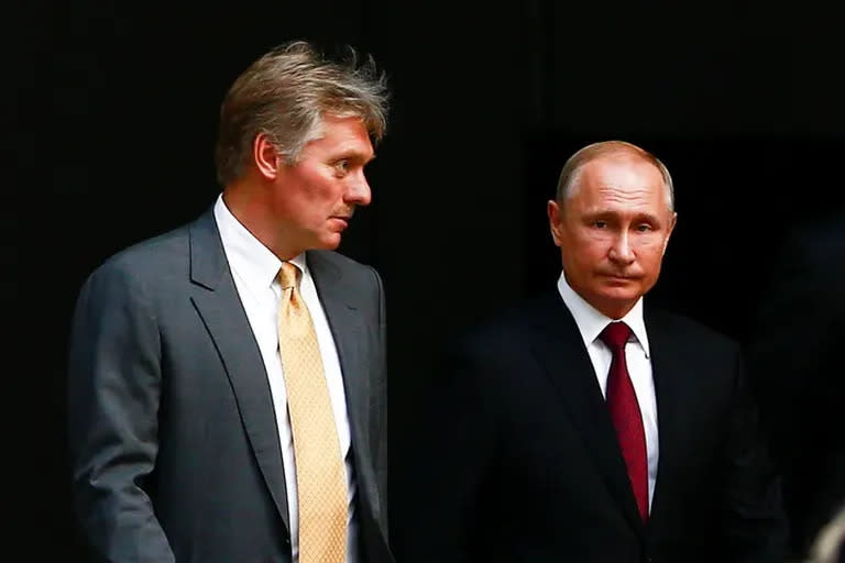 El Secretario de prensa del Kremlin, Dmitry Peskov y el presidente de Rusia, Valdimir Putin