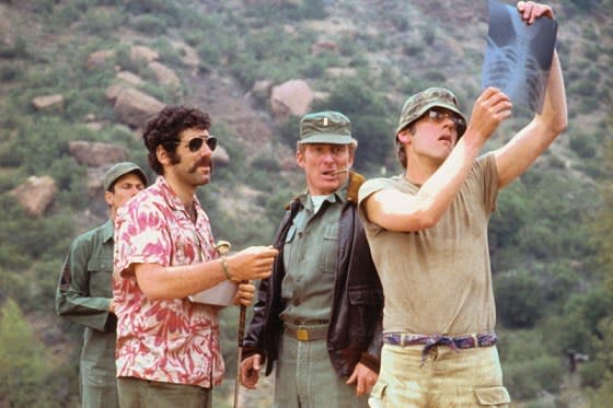 Elliott Gould, Buck Holland, and Donald Sutherland in an episode of "M*A*S*H*".<span class="copyright">Everett Collection</span>