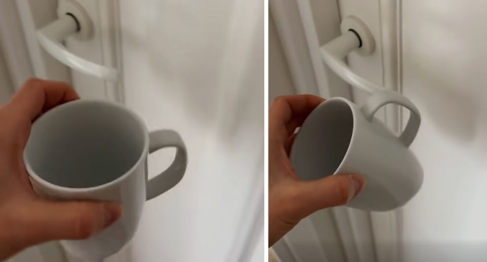 Cup hanging on door handle.