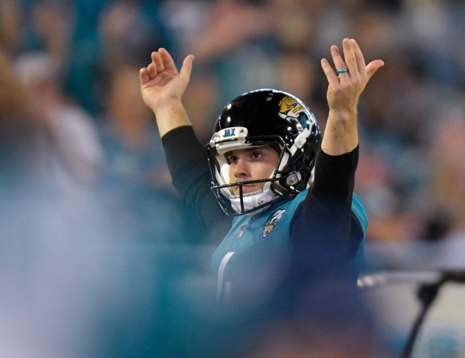 Jacksonville Jaguars kicker Josh Lambo (4) reacts with fans after making a tackle on a Tennessee Titan punt returner in first half action Thursday night, September 19, 2019 at TIAA Bank Field in Jacksonville, Florida. [Will Dickey/Florida Times-Union]