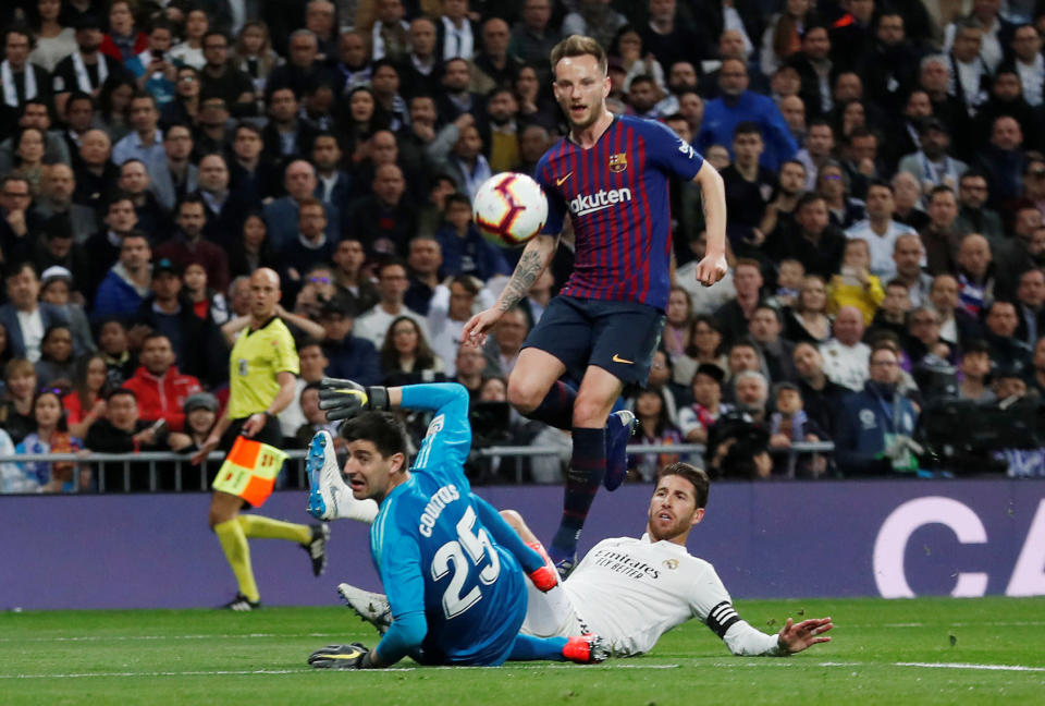 Soccer Football - La Liga Santander - Real Madrid v FC Barcelona - Santiago Bernabeu, Madrid, Spain - March 2, 2019   Barcelona's Ivan Rakitic scores their first goal           REUTERS/Juan Medina