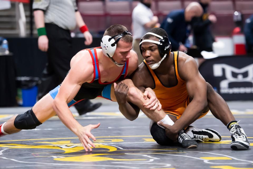 Paniro Johnson, right, was a four-time Pennsylvania state medalist. He's expected to enter Iowa State wrestling's starting lineup next season.
