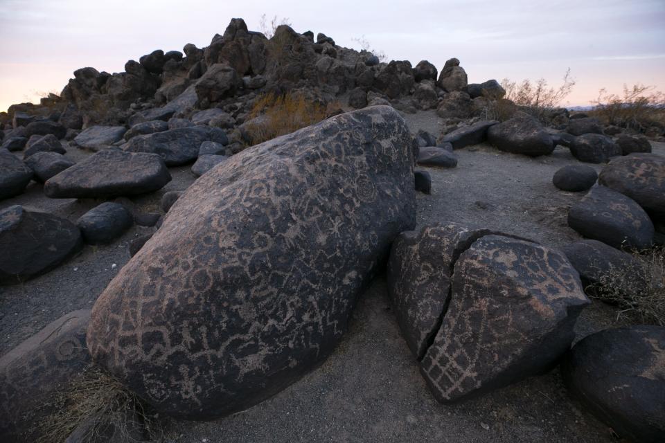Petroglyphs are seen at the Painted Rock Petroglyph Site, managed by the Bureau of Land Management, outside of Gila Bend on Feb. 3, 2021.