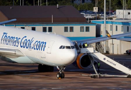 A grounded airplane with the Thomas Cook livery is seen at Manchester Airport