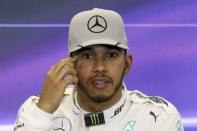 Formula One F1 - U.S. Grand Prix - Circuit of the Americas, Austin, Texas, U.S., 22/10/16. Mercedes' Lewis Hamilton of Britain speaks to the media following the qualifying session where he won the pole position for Sunday's race. REUTERS/Adrees Latif