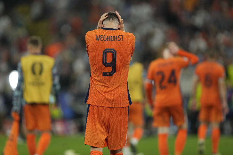 Wout Weghorst of the Netherlands leaves the pitch after a semifinal match between the Netherlands and England at the Euro 2024 soccer tournament in Dortmund, Germany, Wednesday, July 10, 2024. England won 2-1. (AP Photo/Darko Vojinovic)