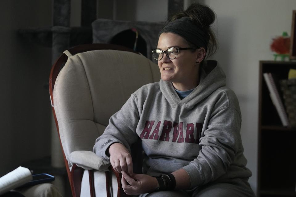 Samantha Richards speaks about her experience with Medicaid, Friday, June 9, 2023, in Bloomington, Ind. Richards has been on Medicaid her whole life and currently works two part-time jobs as a custodian. (AP Photo/Darron Cummings)