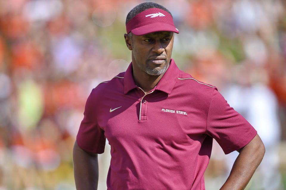 Florida State head coach Willie Taggart watches his team before the start of an NCAA college football game against Clemson Saturday, Oct. 12, 2019, in Clemson, S.C. (AP Photo/Richard Shiro)