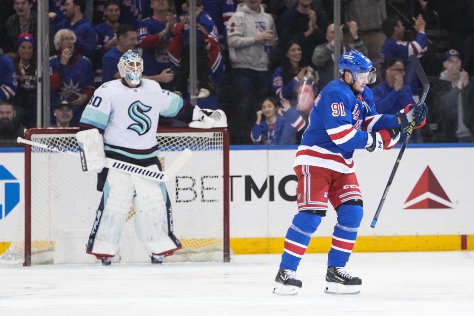 New York Rangers' Vladimir Tarasenko (91) skates past Seattle Kraken goaltender Martin Jones (30) after scoring during the first period of an NHL hockey game Friday, Feb. 10, 2023, in New York. (AP Photo/Frank Franklin II)