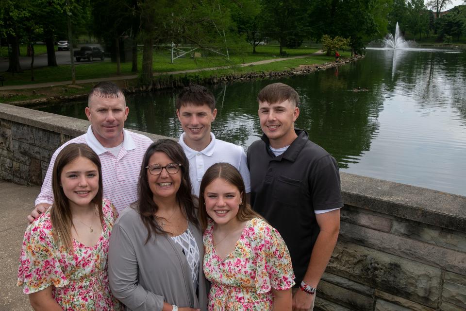 Kristal Spetnagel, Chillicothe City Auditor, stands on the bridge at Yochtangee park with her family Matt Spetnagel, husband, and her children, Ben, Matt, Kara and Emma on May 6, 2024, in Chillicothe, Ohio.